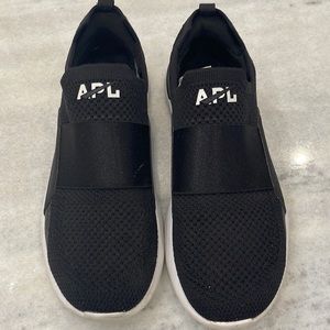 APL women Size 7.5 Black with white soles